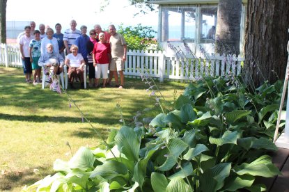 Group picture in front of lake